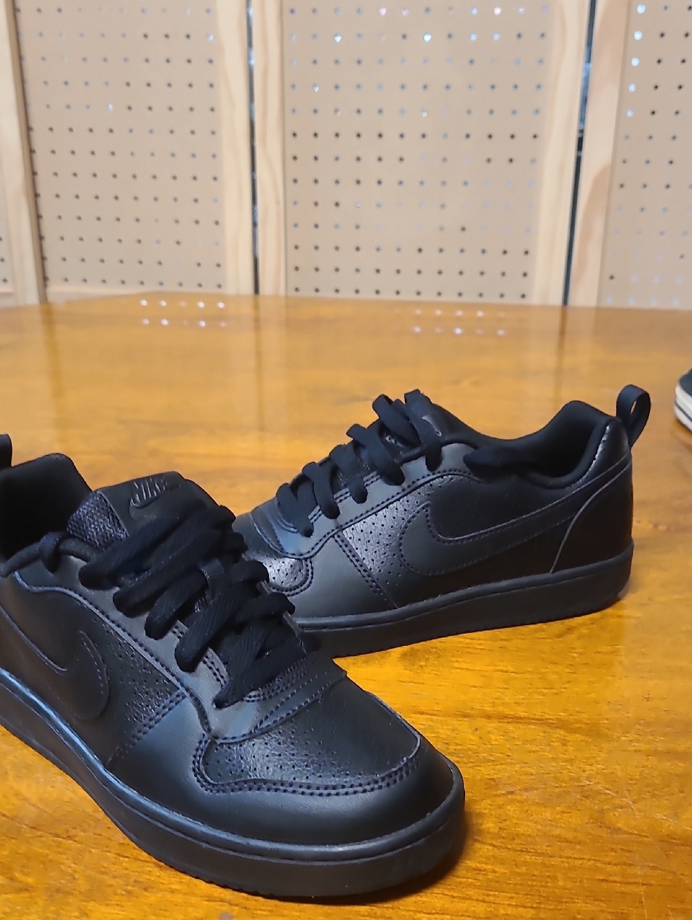 NWOT Nike Black Low-Top Leather Sneakers